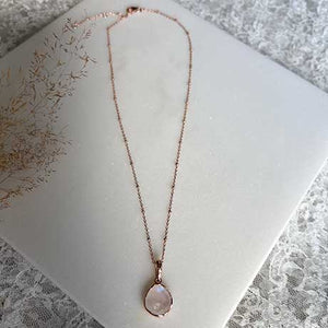 Rose gold necklace with round links and beads
