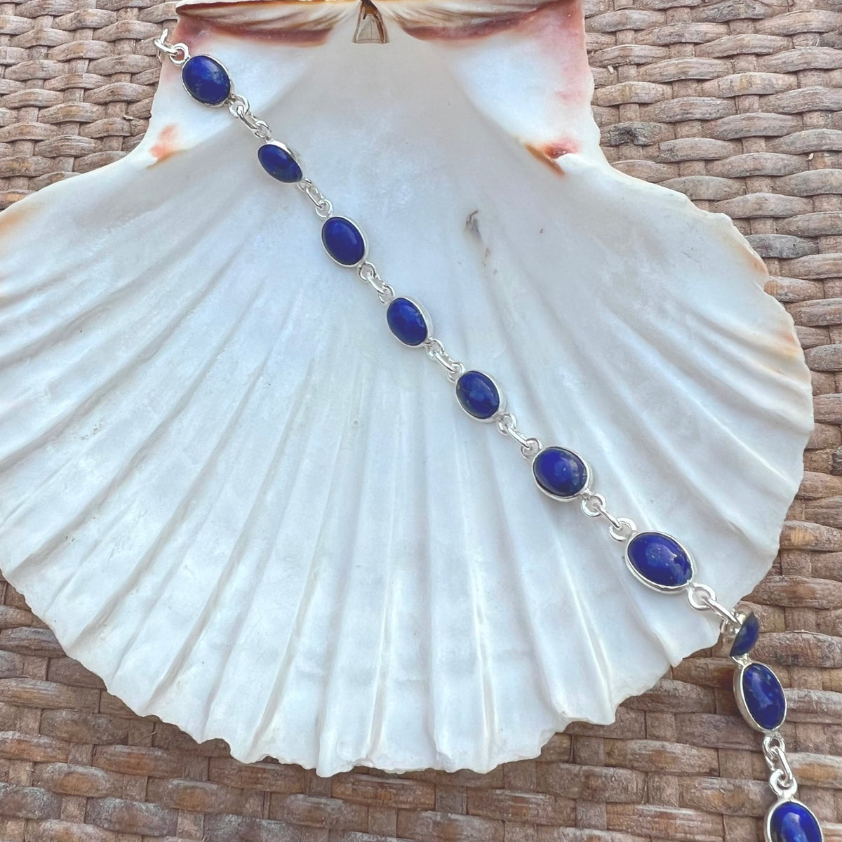 Sterling silver bracelet with oval lapis lazuli
